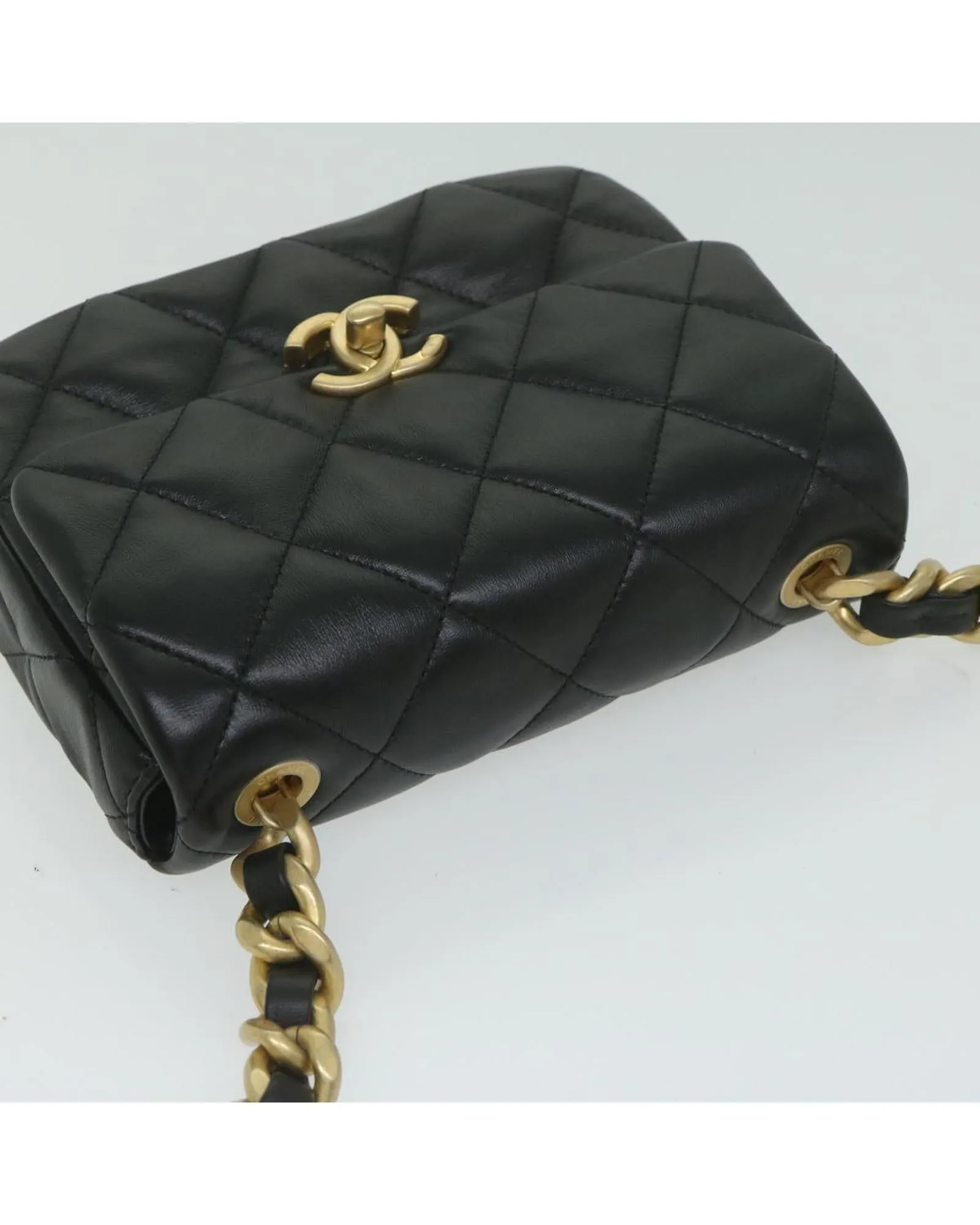 Lamb Skin Matelasse Shoulder Bag with Turn Lock Chain in Black by CHANEL