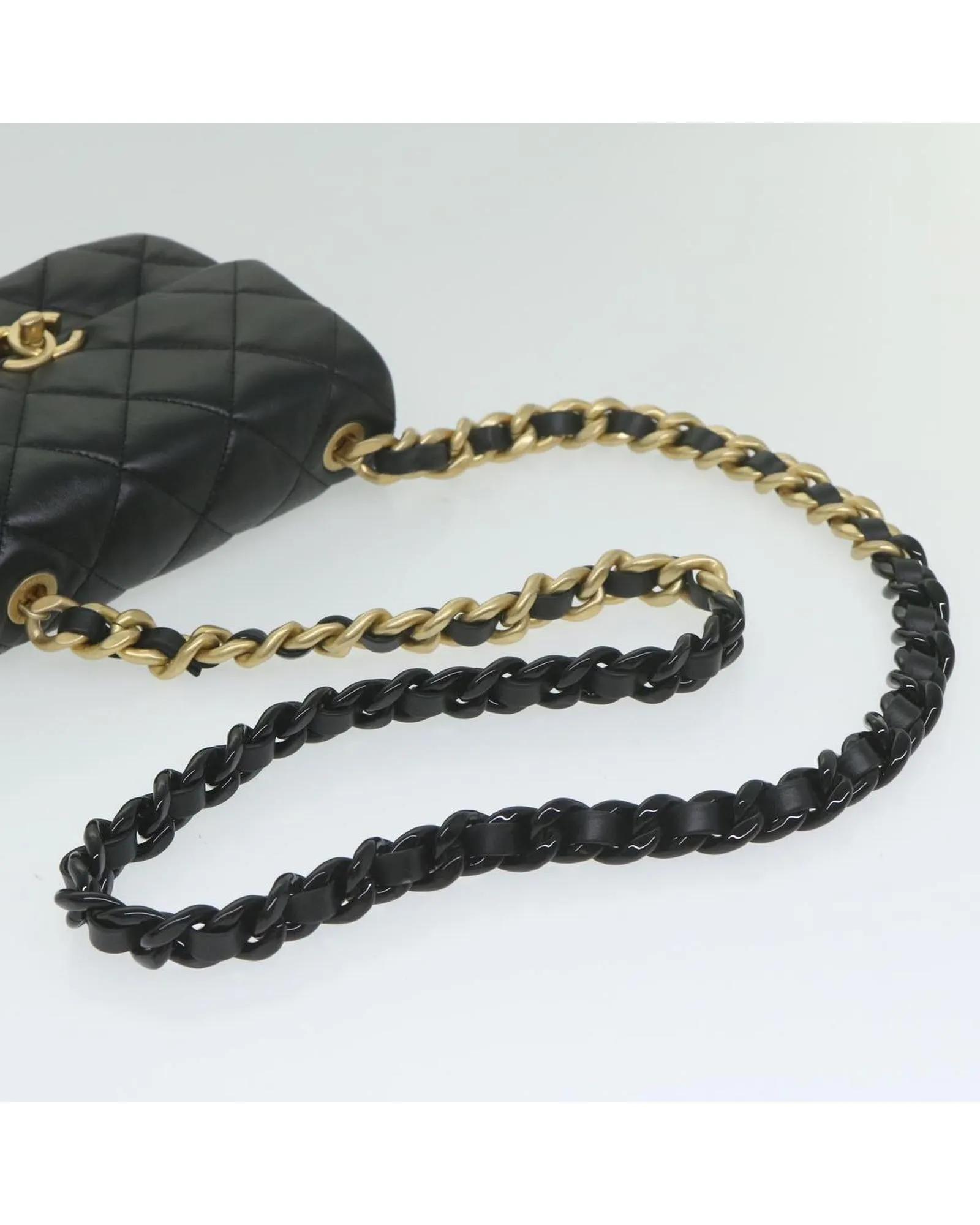 Lamb Skin Matelasse Shoulder Bag with Turn Lock Chain in Black by CHANEL