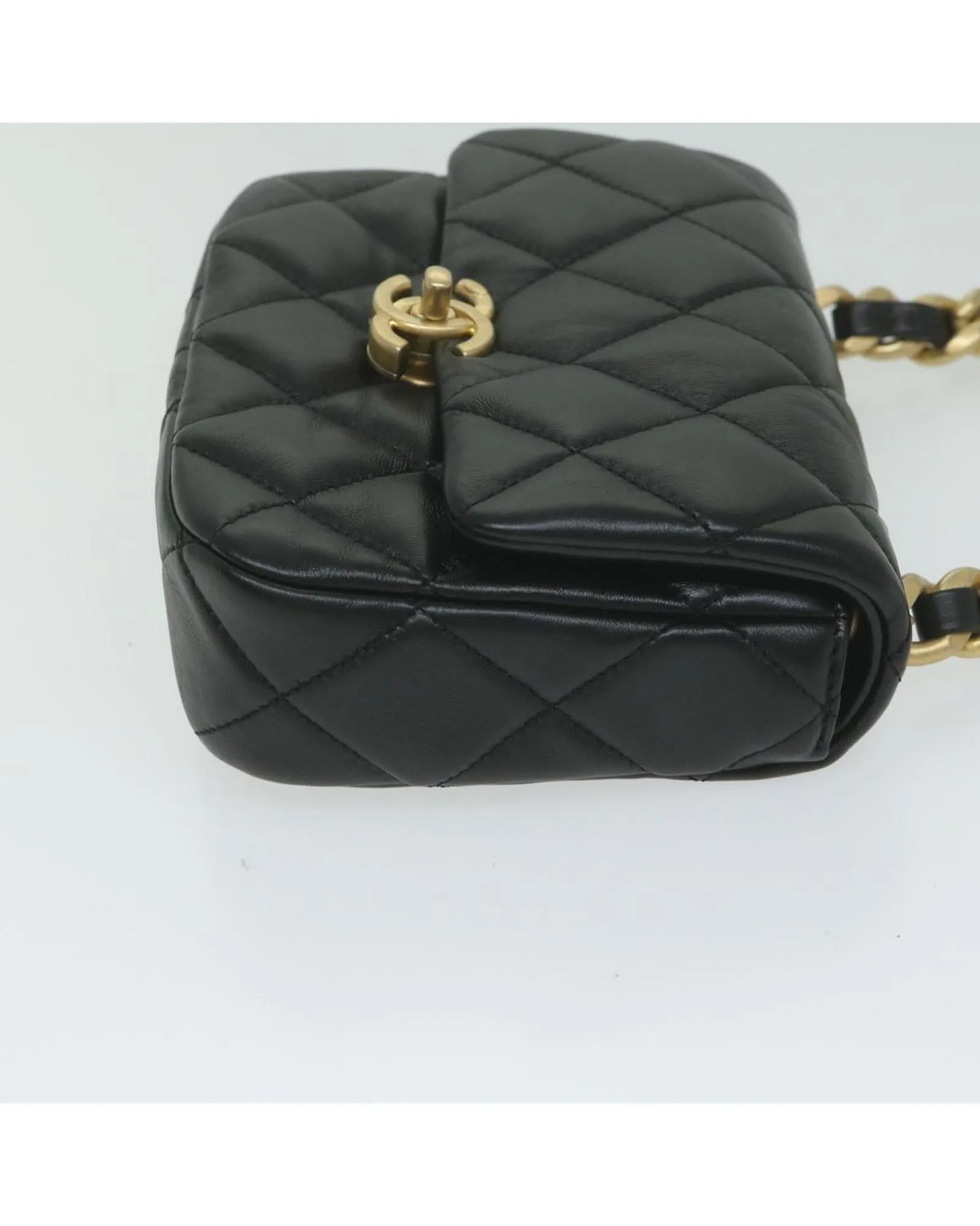 Lamb Skin Matelasse Shoulder Bag with Turn Lock Chain in Black by CHANEL