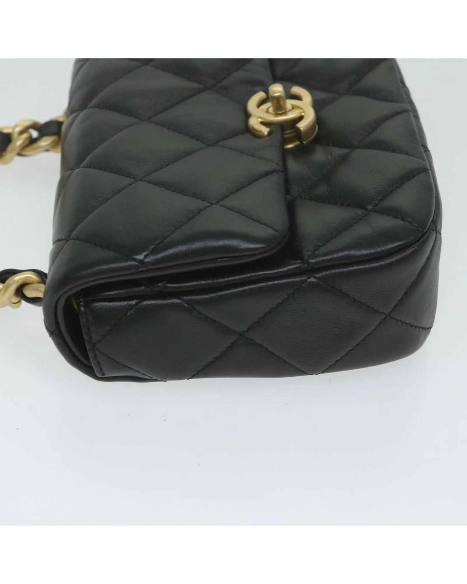 Lamb Skin Matelasse Shoulder Bag with Turn Lock Chain in Black by CHANEL